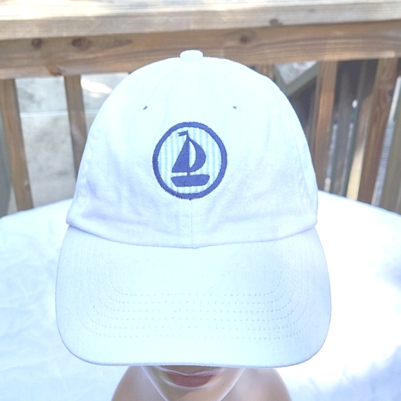 White cap, navy sailboat on light blue seersucker background,  adjustable back - Picture 8 of 8